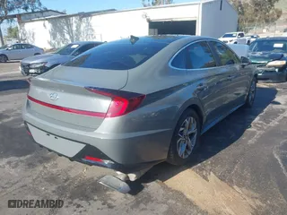 2020 Hyundai Sonata SEL with VIN 5NPEF4JA9LH043973, listed as a IAAI auction lot 41733602 with 56,972 mi miles. Bid and sale history available at carsss.com. Image 4.