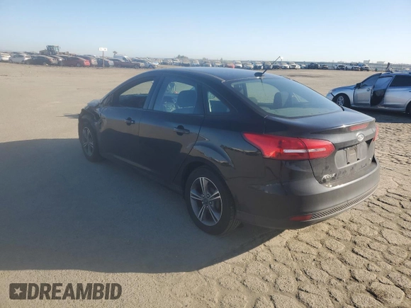 2018 Ford Focus SE with VIN 1FADP3F21JL288026, listed as a Copart auction lot 46908205 with 70,739 mi miles and Salvage Title. Bid and sale history available at carsss.com. Image 2.