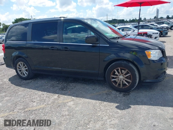 2019 Dodge Grand Caravan SXT with VIN 2C4RDGCG5KR797853, listed as a IAAI auction lot 40332854 with 81,197 mi miles and . Bid and sale history available at DreamBid. Image 13.
