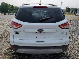 2014 Ford Escape SE с VIN 1FMCU9GXXEUC24025, выставлен на аукционе Copart как лот 58701555 с пробегом 203 520 миль миль и Чистый • Clean title. История ставок и продаж доступна на DreamBid. Изображение 6.
