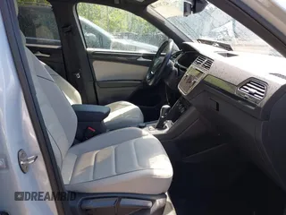 2019 Volkswagen Tiguan SEL Premium with VIN 3VV4B7AXXKM019995, listed as a IAAI auction lot 42170731 with 53,916 mi miles and . Bid and sale history available at DreamBid. Image 5.