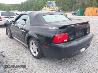 2004 Ford Mustang GT Deluxe z VIN 1FAFP45X64F104911, wystawiony jako IAAI lot #42025366 z przebiegiem 78 686 mil mil oraz . Historia ofert i sprzedaży dostępna na DreamBid. Obrazek 3.