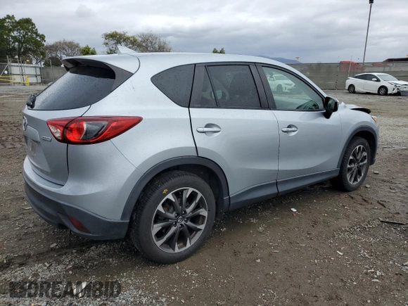 2016 Mazda CX-5 Grand Touring with VIN JM3KE2DY2G0894056, listed as a Copart auction lot 49247815 with 56,039 mi miles and Salvage Title. Bid and sale history available at carsss.com. Image 3.
