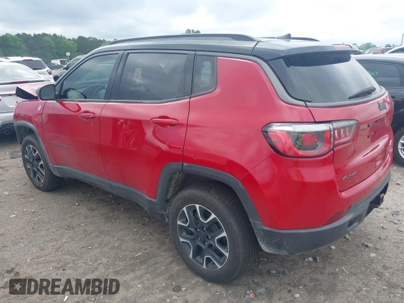 2020 Jeep Compass Trailhawk with VIN 3C4NJDDB5LT166656, listed as a IAAI auction lot 42184661 with 131,080 mi miles and . Bid and sale history available at DreamBid. Image 3.