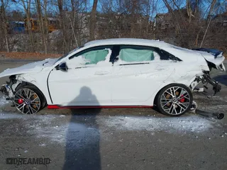 2023 Hyundai Elantra N with VIN KMHLW4AK6PU011540, listed as a IAAI auction lot 41362380 with 18,538 mi miles. Bid and sale history available at carsss.com. Image 14.
