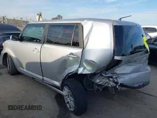 2013 Scion xB with VIN JTLZE4FE2DJ047490, listed as a IAAI auction lot 41812925 with 154,191 mi miles. Bid and sale history available at carsss.com. Image 3.