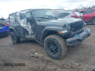 2024 Jeep Wrangler Sport S with VIN 1C4RJXN67RW215606, listed as a IAAI auction lot 41737708 with 8,863 mi miles and . Bid and sale history available at DreamBid. Image 1.
