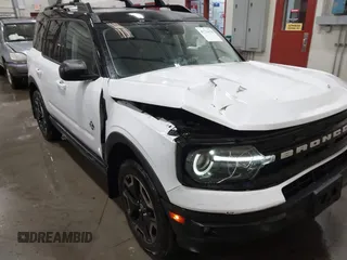 2021 Ford Bronco Sport Outer Banks z VIN 3FMCR9C61MRB05235, wystawiony jako IAAI lot #41726178 z przebiegiem 30 416 mil mil oraz . Historia ofert i sprzedaży dostępna na DreamBid. Obrazek 6.