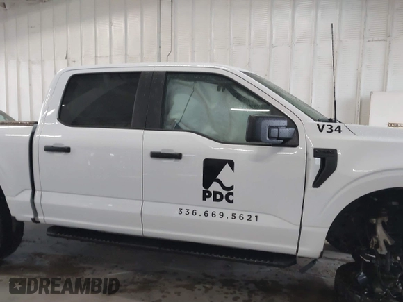 2023 Ford F-150 XL with VIN 1FTEW1EP7PKE20482, listed as a IAAI auction lot 41848669 with 27,933 mi miles. Bid and sale history available at carsss.com. Image 13.