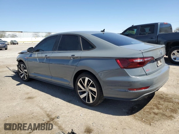 2021 Volkswagen Jetta GLI S с VIN 3VW6T7BUXMM001408, выставлен на аукционе Copart как лот 50454605 с пробегом 73 434 миль миль и Списание • Salvage title. История ставок и продаж доступна на DreamBid. Изображение 2.