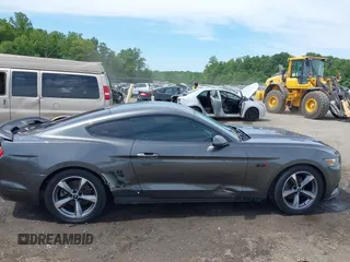 2016 Ford Mustang EcoBoost z VIN 1FA6P8TH6G5263795, wystawiony jako IAAI lot #42310175 z przebiegiem 124 174 mil mil oraz . Historia ofert i sprzedaży dostępna na DreamBid. Obrazek 13.