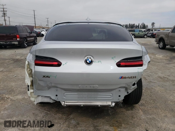 2020 BMW X4 M40i z VIN 5UX2V5C02L9B14571, wystawiony jako Copart lot #44318703 z przebiegiem 14 861 mil mil oraz . Historia ofert i sprzedaży dostępna na DreamBid. Obrazek 6.