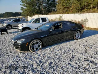 2015 BMW 6 Series 650i xDrive with VIN WBA6B4C50FD761239, listed as a Copart auction lot 80880074 with 112,101 mi miles and Clean Title. Bid and sale history available at carsss.com. Image 1.