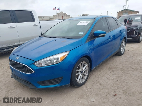 2016 Ford Focus SE z VIN 1FADP3F27GL395235, wystawiony jako IAAI lot #41707132 z przebiegiem 114 897 mil mil oraz . Historia ofert i sprzedaży dostępna na DreamBid. Obrazek 2.