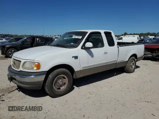 2002 Ford F-150 XL with VIN 1FTRX17W82NA64876, listed as a Copart auction lot 50013045 with 256,345 mi miles and Salvage Title. Bid and sale history available at carsss.com. Image 1.