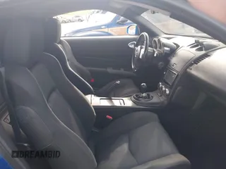 2007 Nissan 350Z Touring z VIN JN1BZ34E37M550112, wystawiony jako IAAI lot #41878280 z przebiegiem 87 374 mil mil oraz . Historia ofert i sprzedaży dostępna na DreamBid. Obrazek 5.