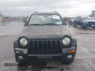 2004 Jeep Liberty Limited with VIN 1J4GL58K94W318379, listed as a IAAI auction lot 41802645 with 275,834 mi miles. Bid and sale history available at carsss.com. Image 12.