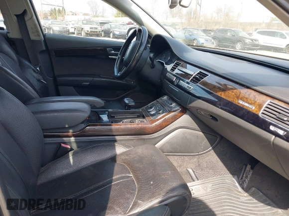 2012 Audi A8 L with VIN WAURVAFD7CN004673, listed as a IAAI auction lot 41768222 with 108,982 mi miles. Bid and sale history available at carsss.com. Image 5.