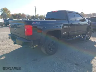 2017 Chevrolet Silverado 1500 LT with VIN 1GCVKREC0HZ293560, listed as a IAAI auction lot 40706331 with 133,438 mi miles. Bid and sale history available at carsss.com. Image 4.