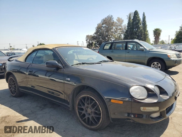 1997 Toyota Celica GT z VIN JT5FG02TXV0044202, wystawiony jako Copart lot #52166575 z przebiegiem 167 292 mil mil oraz Szkoda całkowita • Salvage title. Historia ofert i sprzedaży dostępna na DreamBid. Obrazek 4.