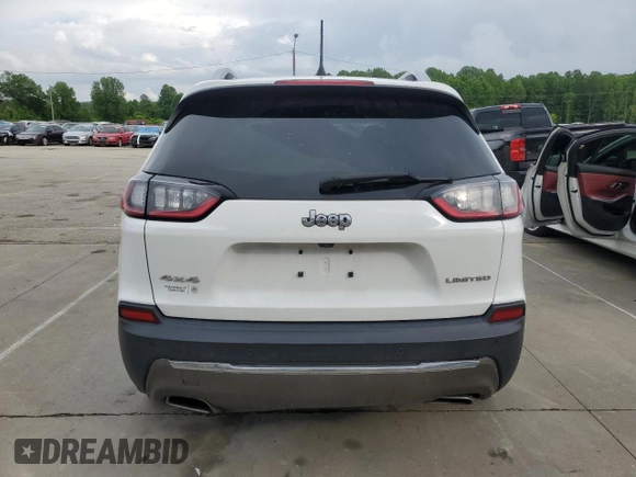 2019 Jeep Cherokee Limited with VIN 1C4PJMDX2KD409798, listed as a Copart auction lot 56913685 with 59,299 mi miles and Salvage title. Bid and sale history available at DreamBid. Image 6.