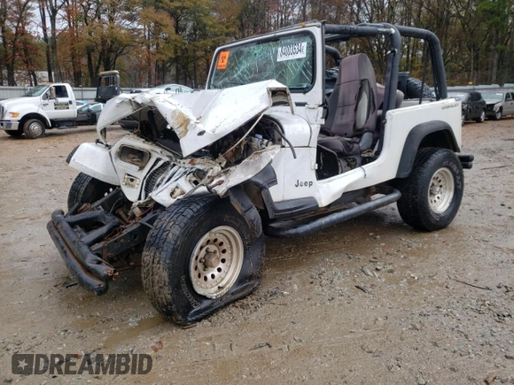 1995 Jeep Wrangler S with VIN 1J4FY19P7SP205053, listed as a Copart auction lot 84003534 with 215,769 mi miles and Salvage Title. Bid and sale history available at carsss.com. Image 1.