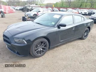 2012 Dodge Charger SE with VIN 2C3CDXBG1CH218814, listed as a IAAI auction lot 42125550 with 113,784 mi miles. Bid and sale history available at carsss.com. Image 2.