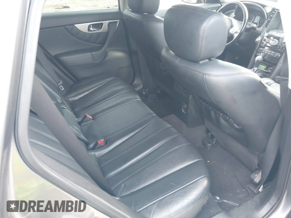 2015 Infiniti QX70 with VIN JN8CS1MWXFM480906, listed as a IAAI auction lot 41177811 with 176,527 mi miles and . Bid and sale history available at DreamBid. Image 8.