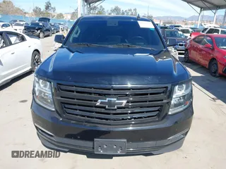 2019 Chevrolet Suburban LT with VIN 1GNSCJKCXKR332739, listed as a IAAI auction lot 41636530 with 104,997 mi miles and . Bid and sale history available at DreamBid. Image 12.