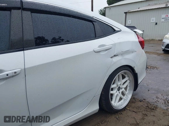 2020 Honda Civic Si z VIN 2HGFC1E59LH707630, wystawiony jako IAAI lot #41764310 z przebiegiem 116 714 mil mil oraz . Historia ofert i sprzedaży dostępna na DreamBid. Obrazek 19.