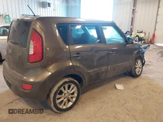 2012 Kia Soul + with VIN KNDJT2A64C7452975, listed as a IAAI auction lot 41635133 with 164,937 mi miles. Bid and sale history available at carsss.com. Image 4.
