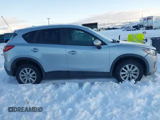 2016 Mazda CX-5 Touring with VIN JM3KE4CY9G0904000, listed as a IAAI auction lot 41186630 with 73,900 mi miles. Bid and sale history available at carsss.com. Image 13.