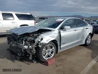 2016 Ford Fusion Energi Titanium with VIN 3FA6P0SU6GR144898, listed as a IAAI auction lot 41912557 with 173,415 mi miles. Bid and sale history available at carsss.com. Image 6.