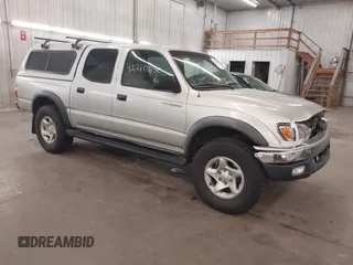 2001 Toyota Tacoma PreRunner z VIN 5TEGN92N51Z845148, wystawiony jako IAAI lot #42210630 z przebiegiem 387 766 mil mil oraz . Historia ofert i sprzedaży dostępna na DreamBid. Obrazek 1.