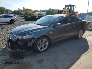 2015 Ford Taurus SEL with VIN 1FAHP2H84FG149831, listed as a Copart auction lot 64256675 with 201,957 mi miles and Salvage title. Bid and sale history available at DreamBid. Image 1.
