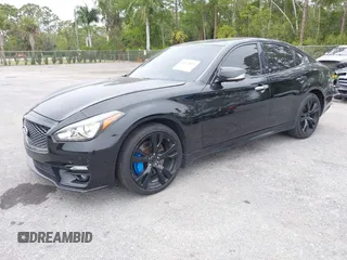 2015 Infiniti Q70 z VIN JN1BY1AR6FM561165, wystawiony jako IAAI lot #41622832 z przebiegiem 121 522 mil mil oraz . Historia ofert i sprzedaży dostępna na DreamBid. Obrazek 18.