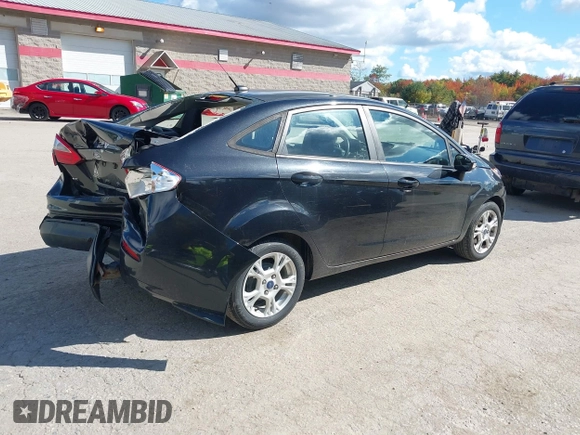 2015 Ford Fiesta SE with VIN 3FADP4BJXFM189438, listed as a IAAI auction lot 40535245 with 102,013 mi miles. Bid and sale history available at carsss.com. Image 4.