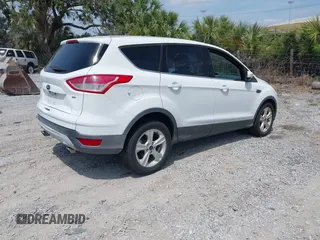 2015 Ford Escape SE with VIN 1FMCU0G74FUB88670, listed as a IAAI auction lot 42115919 with 129,969 mi miles. Bid and sale history available at carsss.com. Image 4.