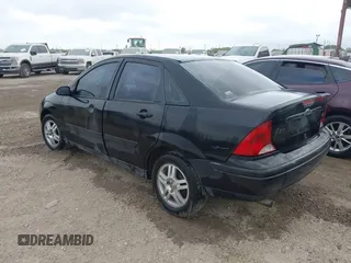 2004 Ford Focus ZTS with VIN 1FAFP38Z54W124851, listed as a IAAI auction lot 41936135 with Not Provided miles and . Bid and sale history available at carsss.com. Image 3.