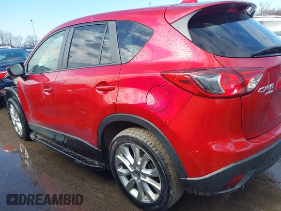 2015 Mazda CX-5 Grand Touring with VIN JM3KE4DY7F0477770, listed as a IAAI auction lot 41617849 with 106,135 mi miles. Bid and sale history available at carsss.com. Image 15.