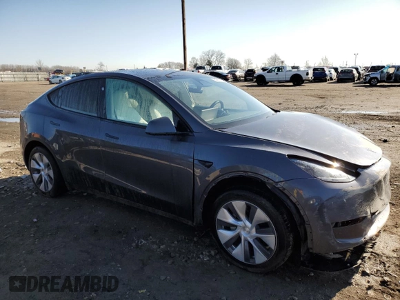 2023 Tesla Model Y Long Range z VIN 7SAYGDEE0PA206005, wystawiony jako Copart lot #50681145 z przebiegiem 31 989 mil mil oraz Szkoda całkowita • Salvage title. Historia ofert i sprzedaży dostępna na DreamBid. Obrazek 4.
