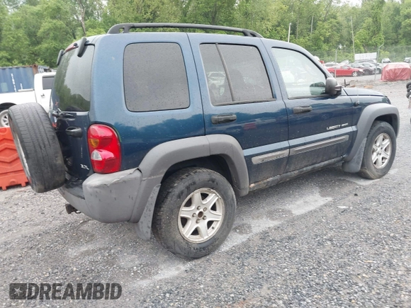 2003 Jeep Liberty Sport with VIN 1J4GL48K63W585973, listed as a IAAI auction lot 42235322 with 316,872 mi miles and . Bid and sale history available at DreamBid. Image 4.