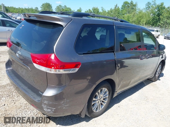 2012 Toyota Sienna XLE AAS with VIN 5TDYK3DC5CS259216, listed as a IAAI auction lot 42143551 with 219,957 mi miles and . Bid and sale history available at DreamBid. Image 4.