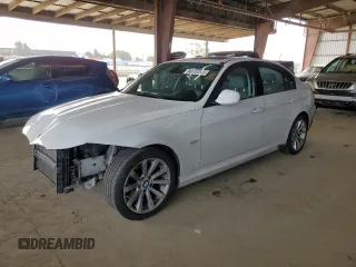 2011 BMW 3 Series 328i with VIN WBAPH5G5XBNM74238, listed as a Copart auction lot 60737245 with 102,989 mi miles and Salvage title. Bid and sale history available at DreamBid. Image 1.