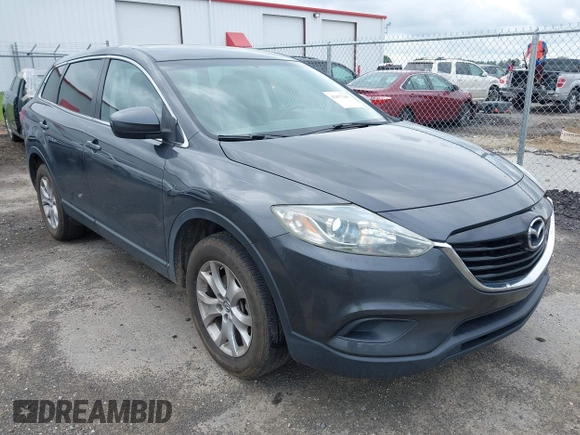 2014 Mazda CX-9 Touring z VIN JM3TB2CAXE0445450, wystawiony jako IAAI lot #42477260 z przebiegiem 139 583 mil mil oraz . Historia ofert i sprzedaży dostępna na DreamBid. Obrazek 1.