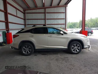 2019 Lexus RX 350 with VIN JTJBZMCA2K2039042, listed as a IAAI auction lot 42469481 with 84,794 mi miles and . Bid and sale history available at DreamBid. Image 13.