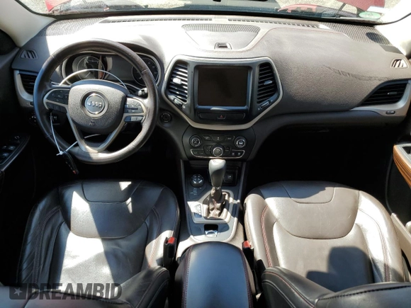 2014 Jeep Cherokee Trailhawk с VIN 1C4PJMBS8EW268056, выставлен на аукционе Copart как лот 54951885 с пробегом 111 678 миль миль и Списание • Salvage title. История ставок и продаж доступна на DreamBid. Изображение 8.