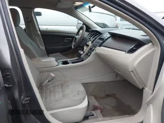 2011 Ford Taurus SE with VIN 1FAHP2DW2BG181059, listed as a IAAI auction lot 42036867 with 103,394 mi miles. Bid and sale history available at carsss.com. Image 5.