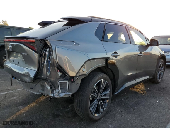 2024 Toyota bZ4X XLE with VIN JTMAAAAA6RA032697, listed as a Copart auction lot 81542854 with 27,771 mi miles and Salvage Title. Bid and sale history available at carsss.com. Image 3.