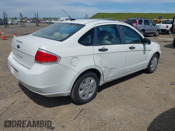 2011 Ford Focus S with VIN 1FAHP3EN7BW113051, listed as a IAAI auction lot 42002223 with 220,895 mi miles. Bid and sale history available at carsss.com. Image 4.